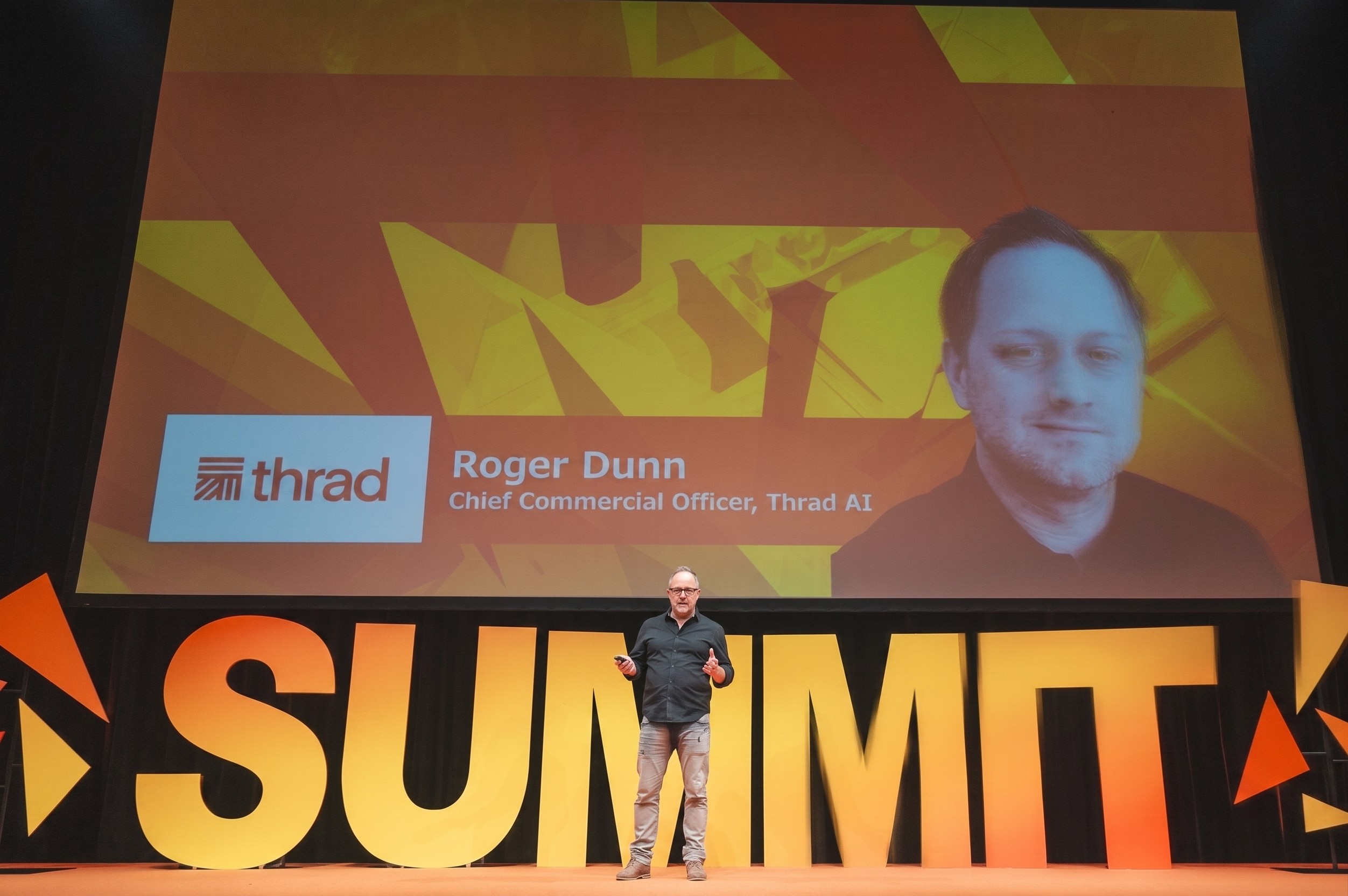 Roger Dunn, Chief Commercial Officer at Thrad, presenting on the Summit stage.