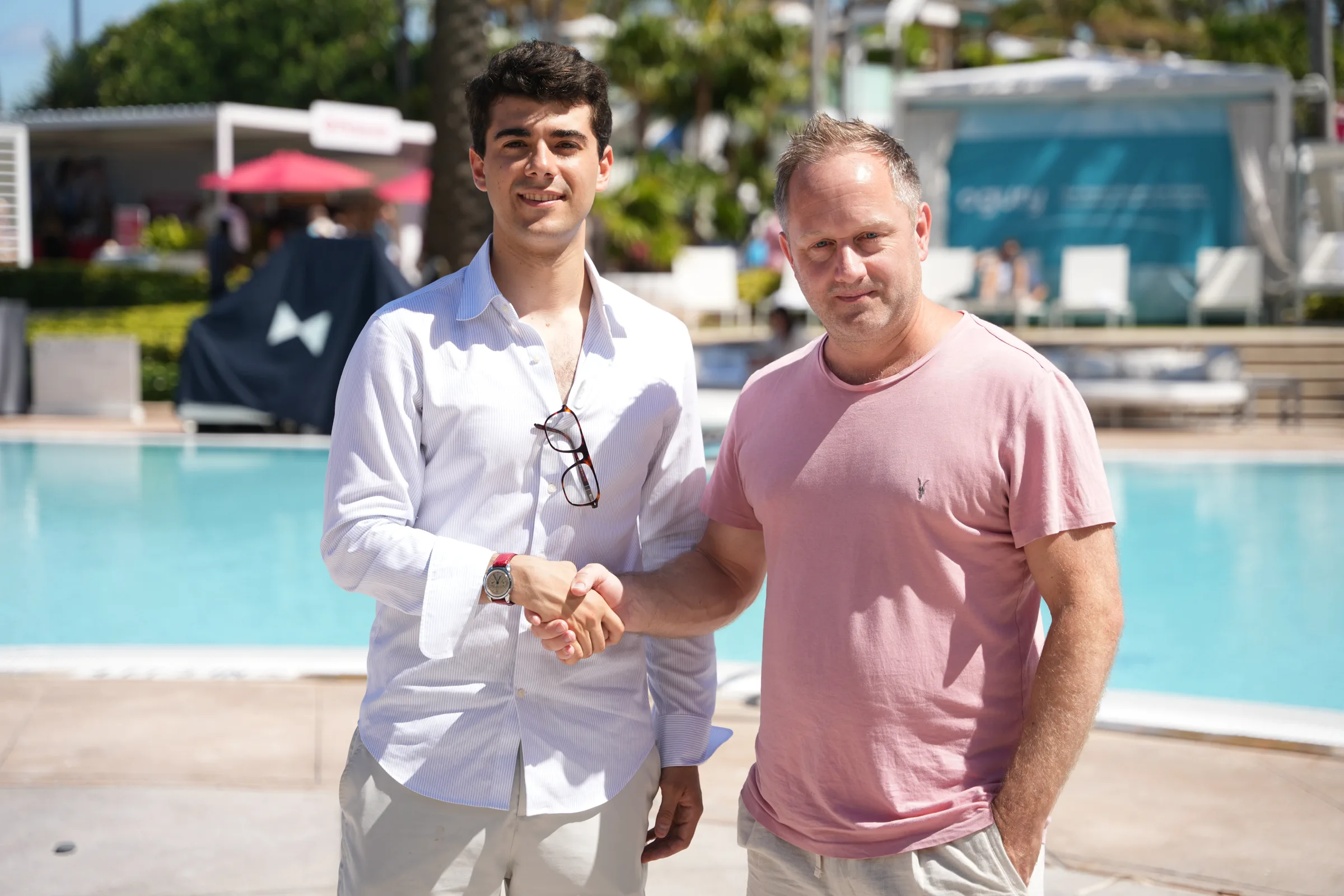 Andrea Tortella shaking hands with Roger Dunn at Cannes Lions